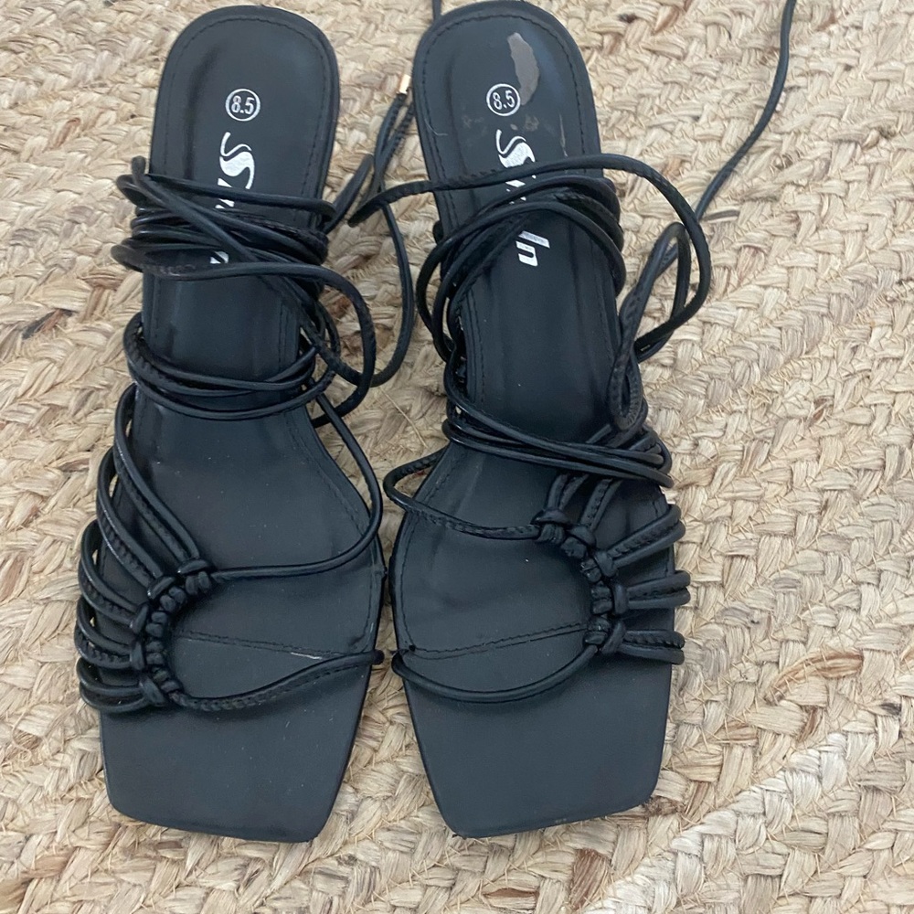 Strappy black heels
